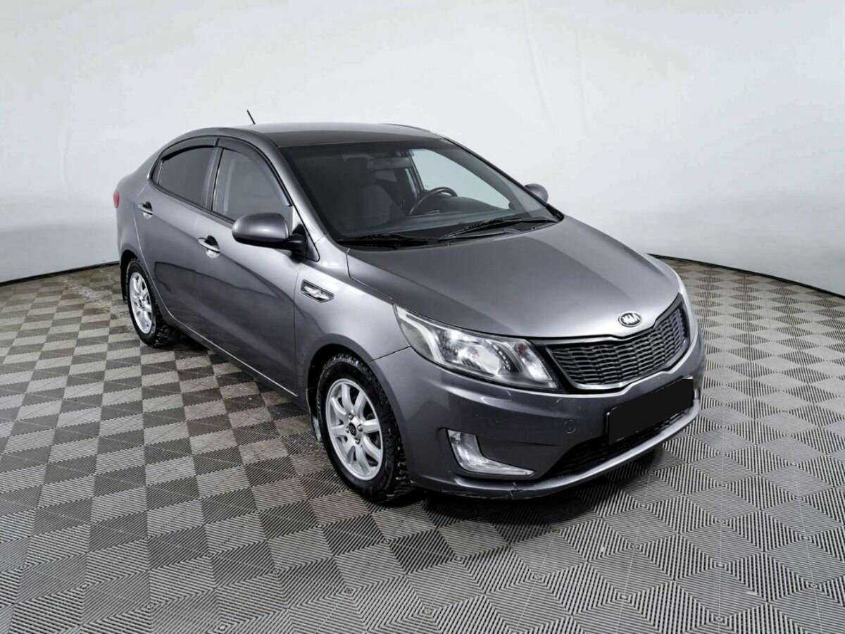 Kia Rio с пробегом — 2014 год. Фото: #2