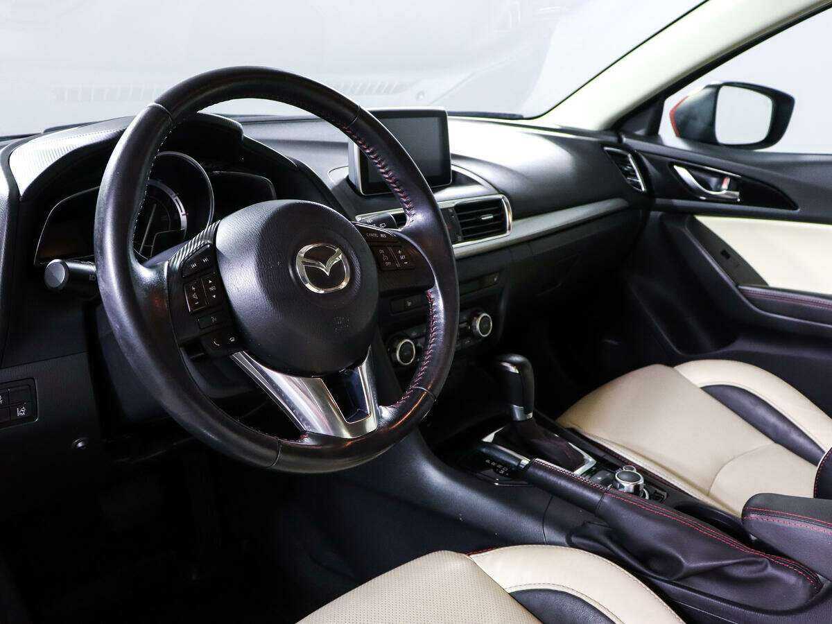 Mazda 3 с пробегом — 2014 год. Фото: #11