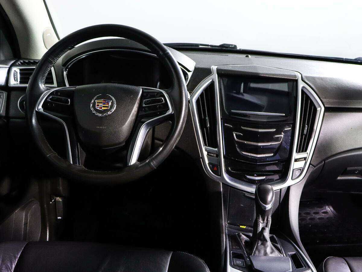 Cadillac SRX с пробегом — 2015 год. Фото: #9