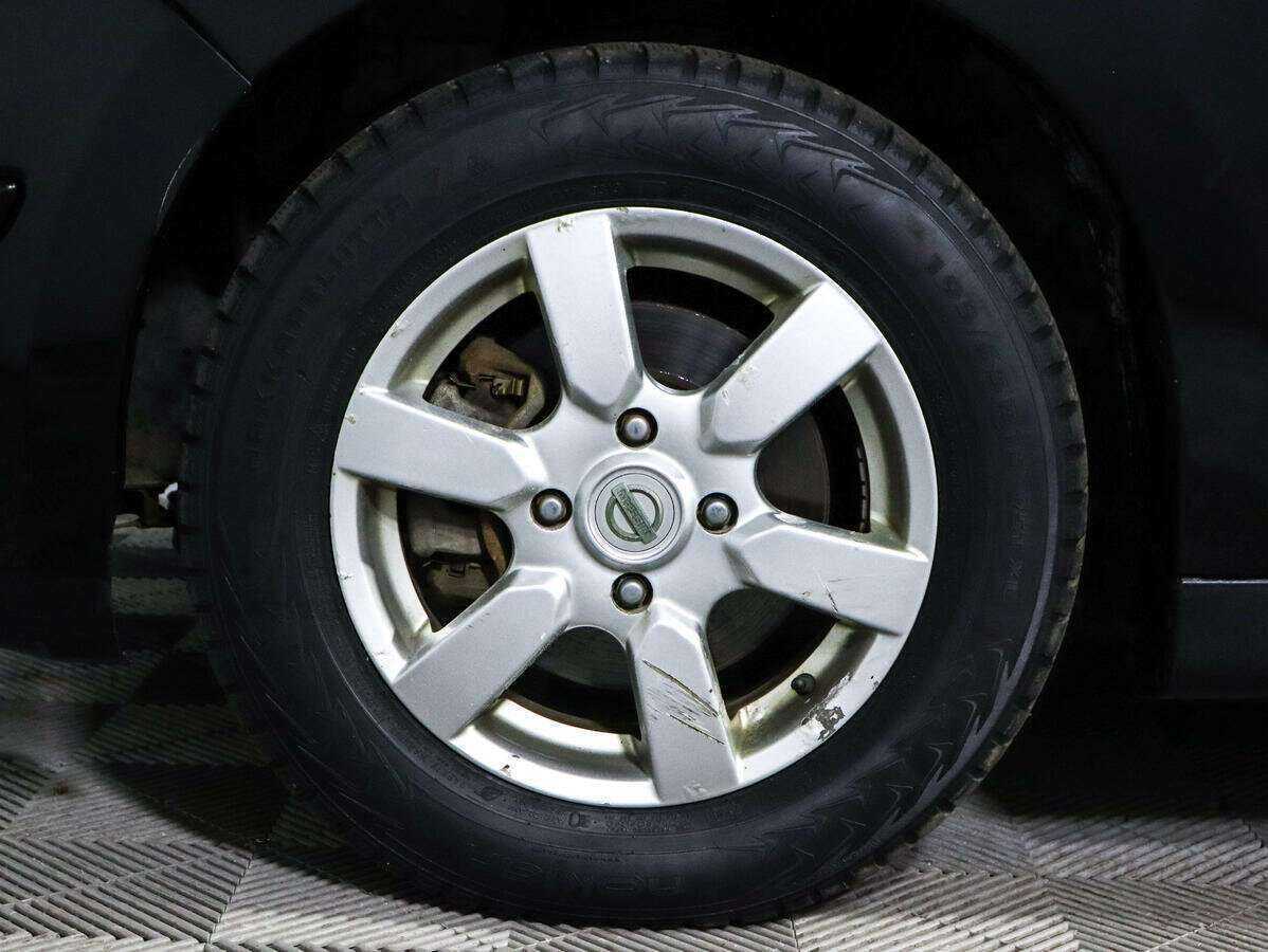 Nissan Tiida с пробегом — 2008 год. Фото: #11