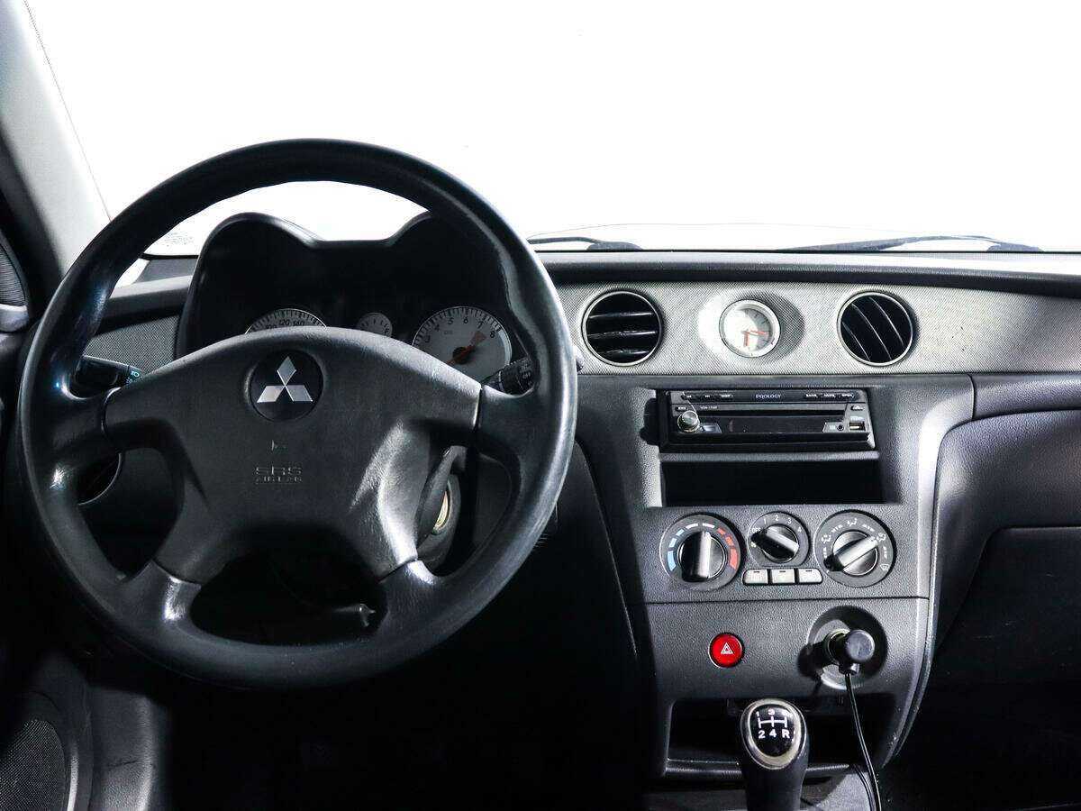 Mitsubishi Outlander с пробегом — 2006 год. Фото: #11