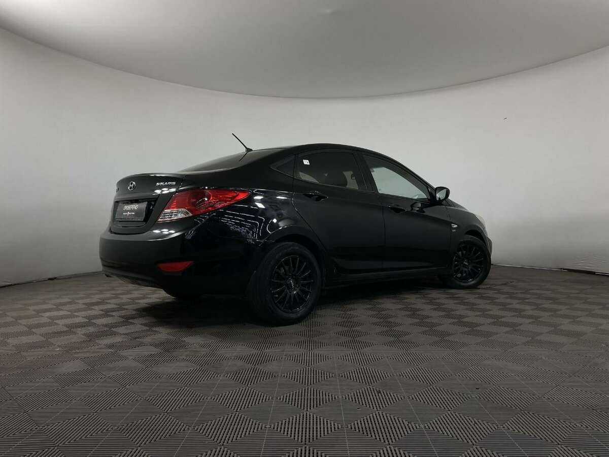 Hyundai Solaris с пробегом — 2011 год. Фото: #5