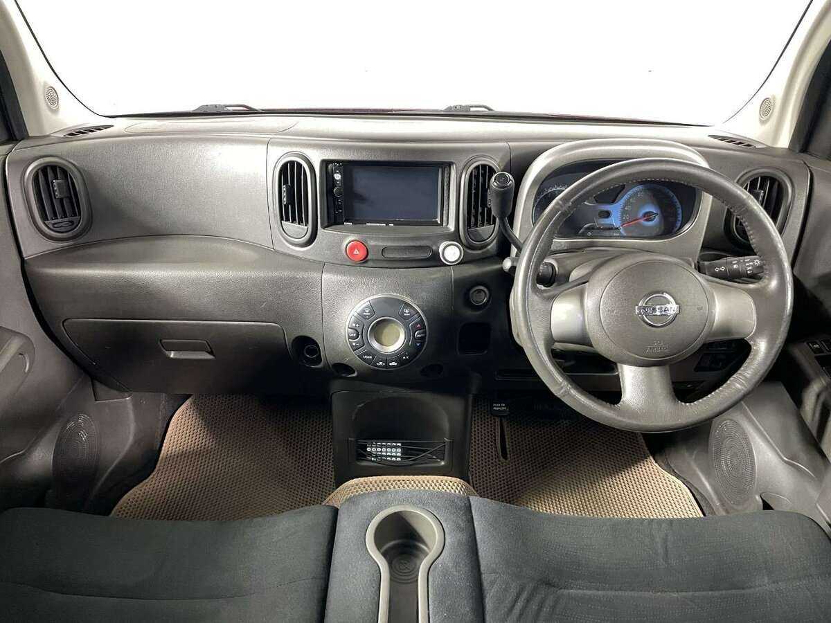 Nissan Cube с пробегом — 2009 год. Фото: #6
