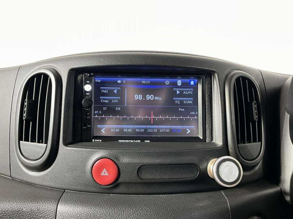 Nissan Cube с пробегом — 2009 год. Фото: #10