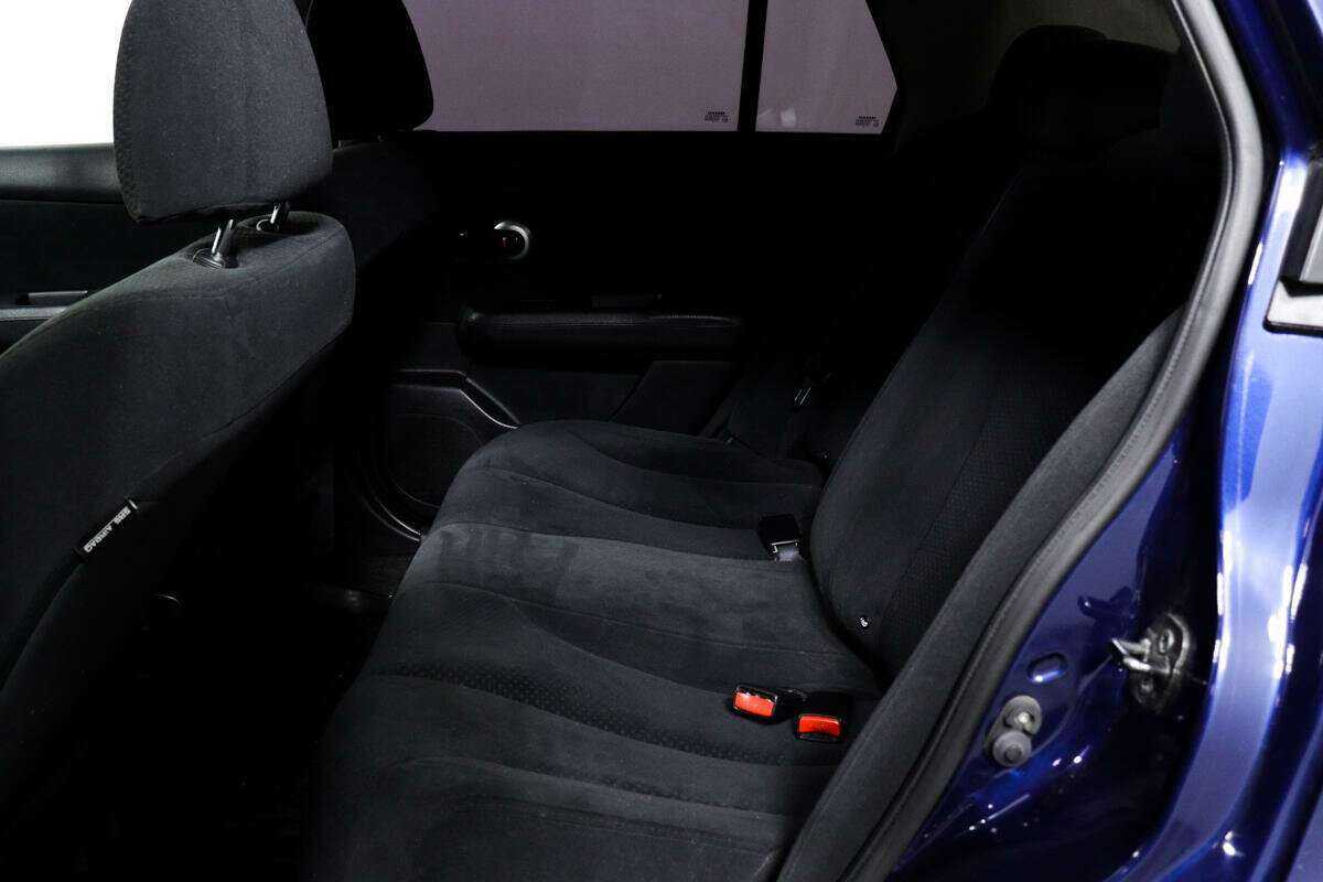 Nissan Tiida с пробегом — 2010 год. Фото: #11