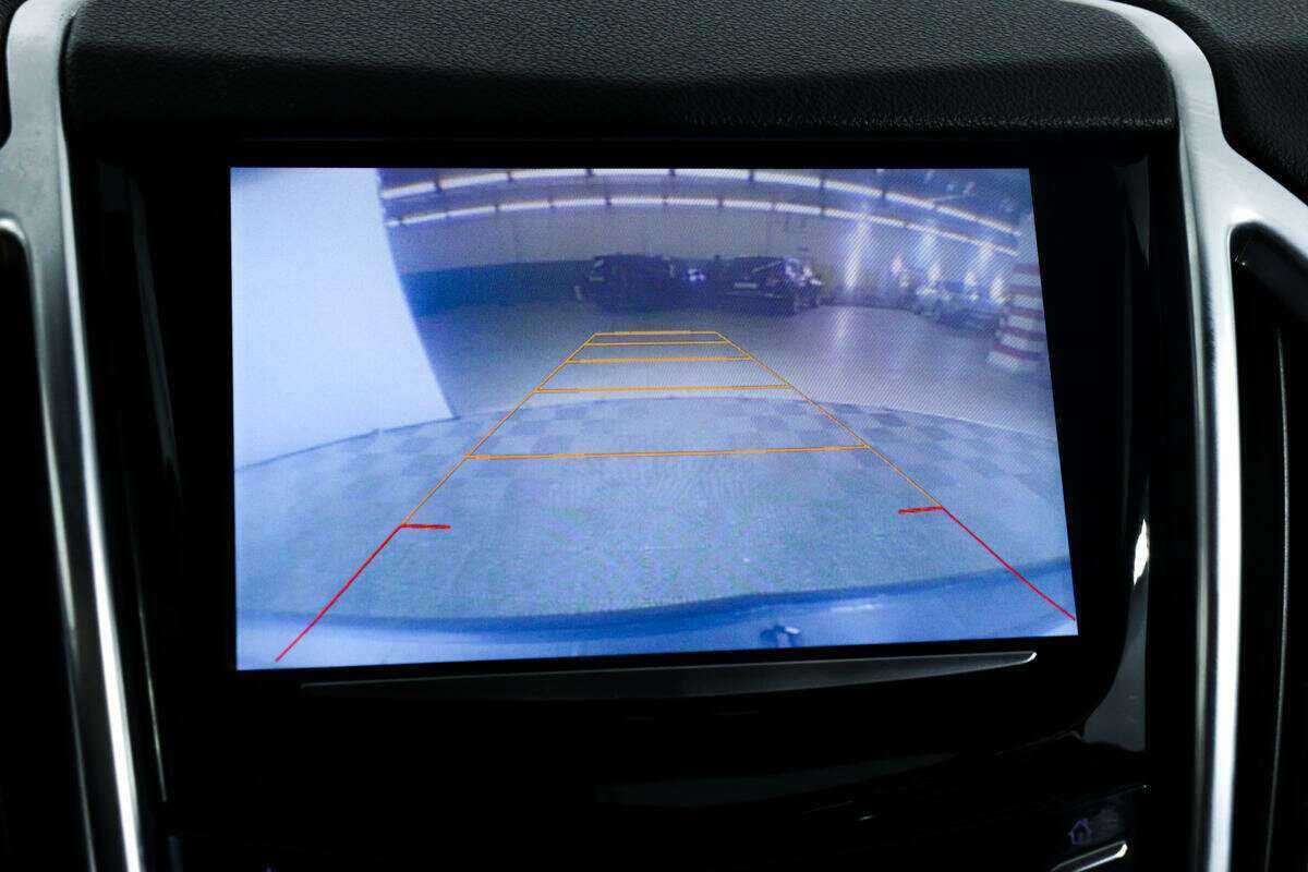 Cadillac SRX с пробегом — 2014 год. Фото: #11