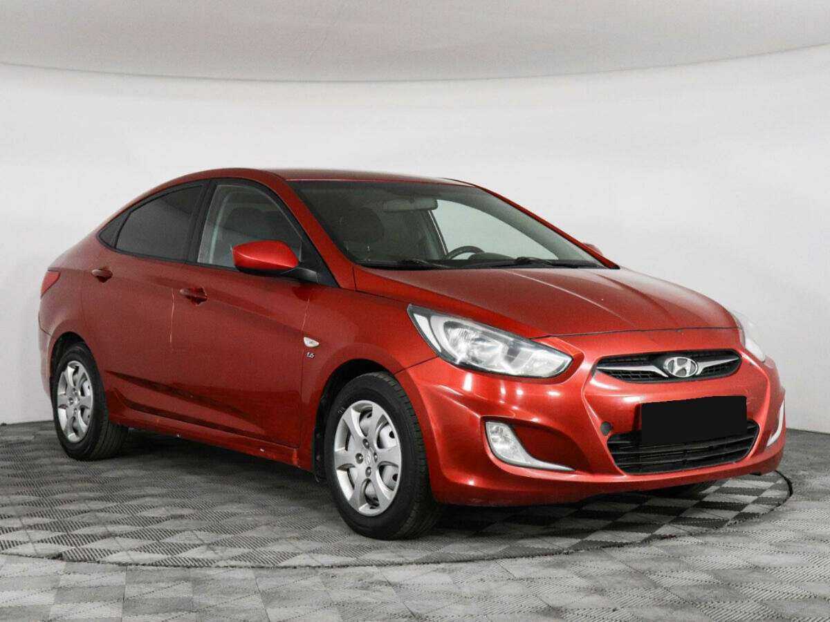 Hyundai Solaris с пробегом — 2011 год. Фото: #1