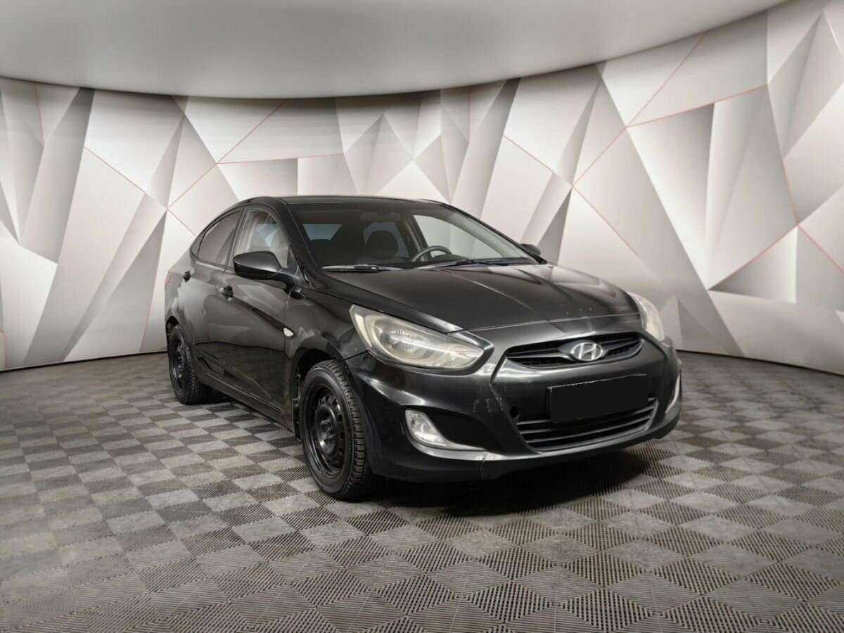 Hyundai Solaris с пробегом — 2011 год. Фото: #2