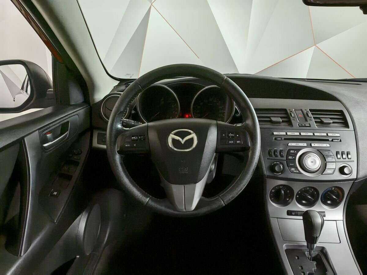 Mazda 3 с пробегом — 2010 год. Фото: #13