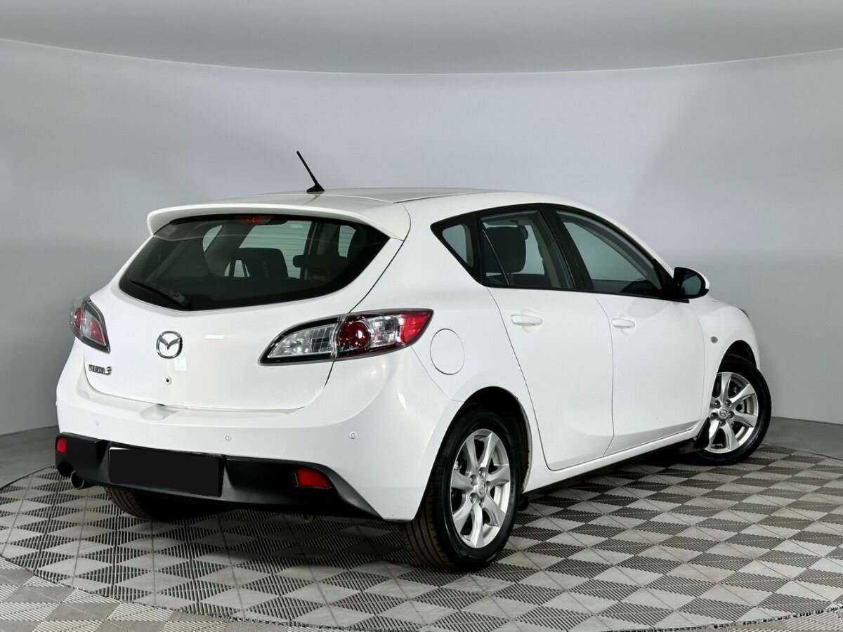 Mazda 3 с пробегом — 2011 год. Фото: #1