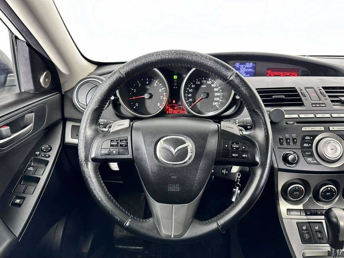 Mazda 3 с пробегом — 2011 год. Фото: #11