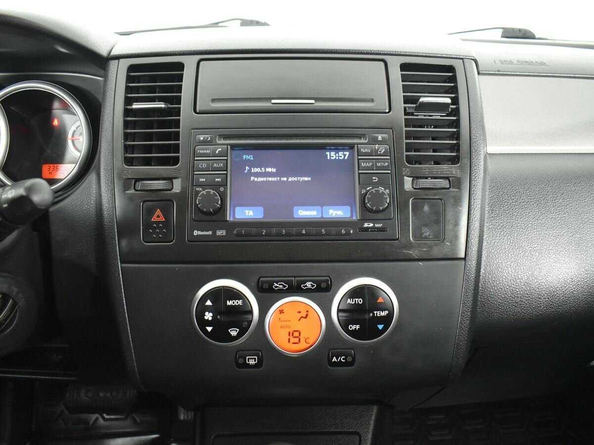 Nissan Tiida с пробегом — 2011 год. Фото: #12