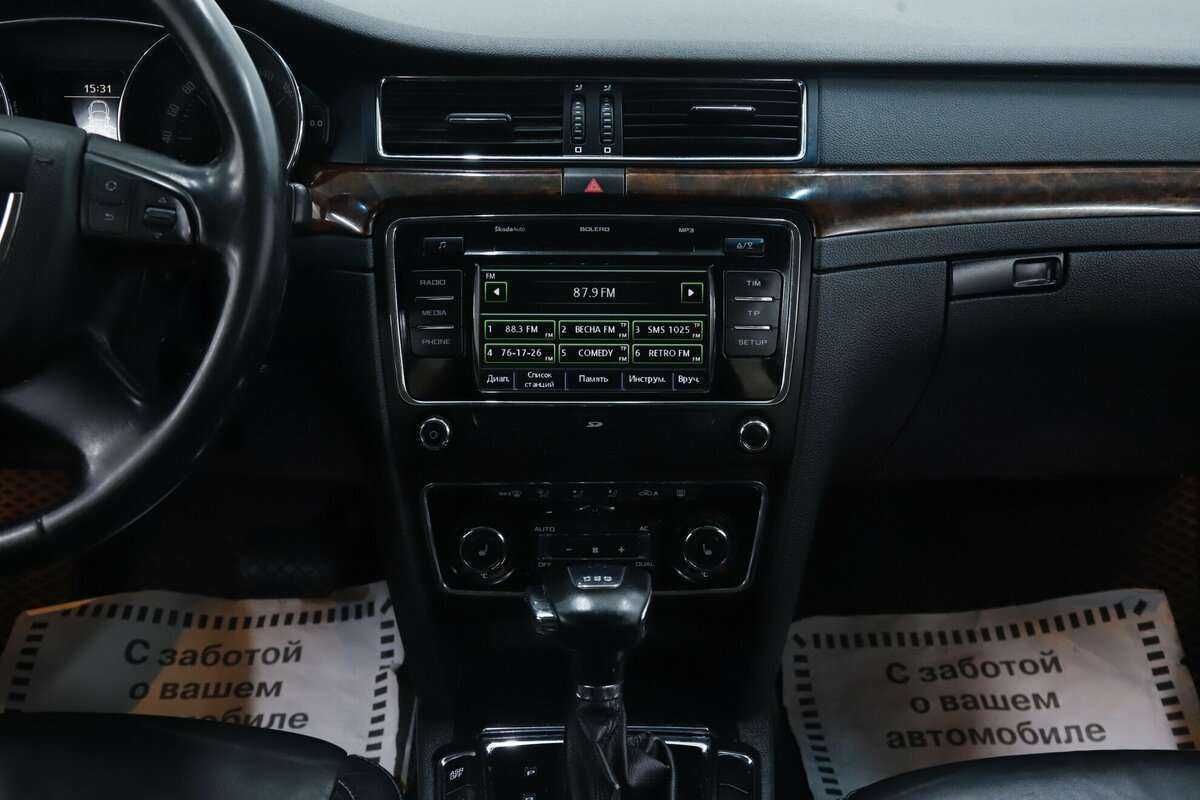 Skoda Superb с пробегом — 2013 год. Фото: #13