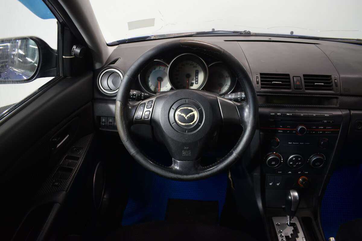 Mazda 3 с пробегом — 2006 год. Фото: #7