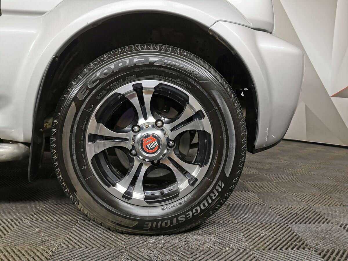 Suzuki Jimny с пробегом — 2011 год. Фото: #14