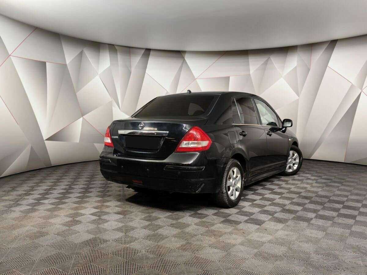 Nissan Tiida с пробегом — 2010 год. Фото: #1