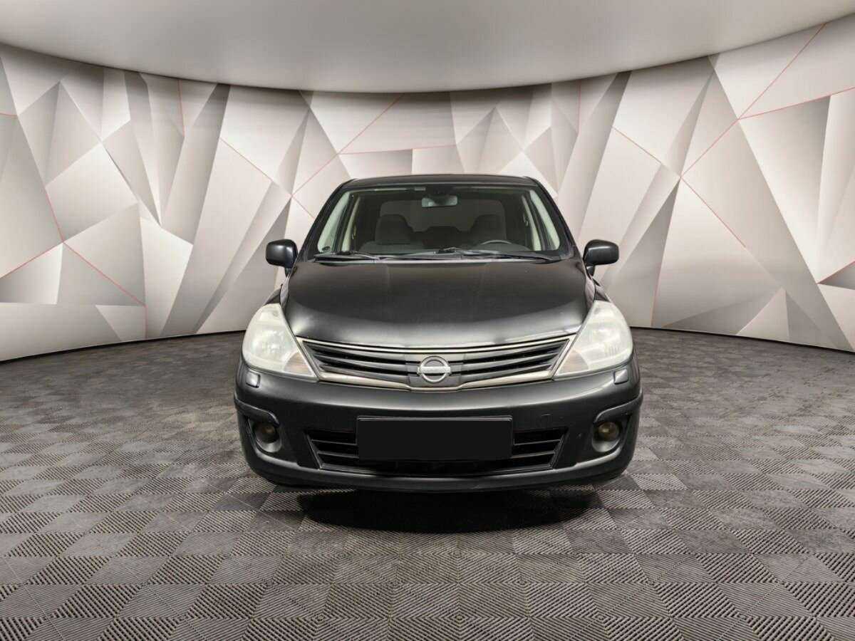 Nissan Tiida с пробегом — 2010 год. Фото: #6