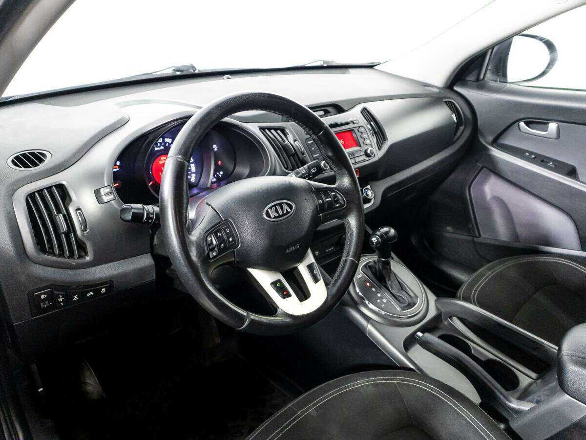 Kia Sportage с пробегом — 2011 год. Фото: #10