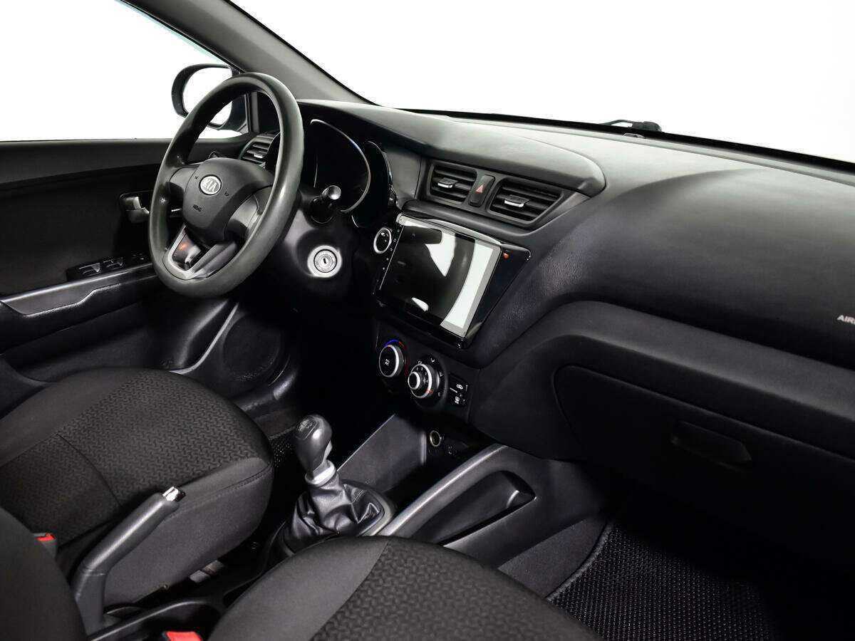 Kia Rio с пробегом — 2011 год. Фото: #8