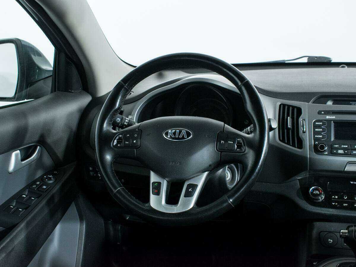 Kia Sportage с пробегом — 2015 год. Фото: #13