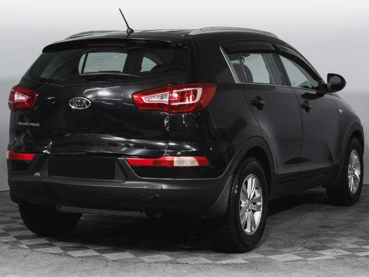 Kia Sportage с пробегом — 2010 год. Фото: #4