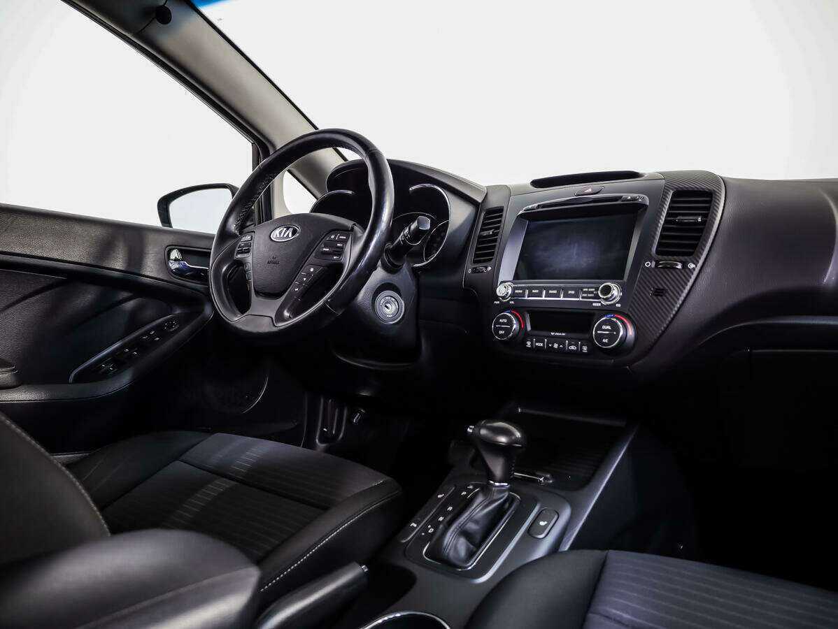 Kia Cerato с пробегом — 2015 год. Фото: #7