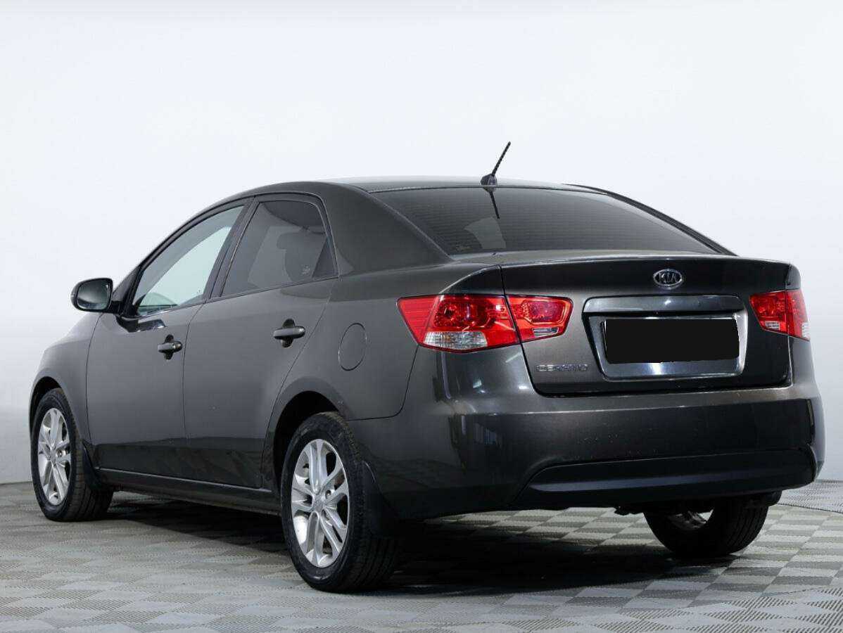 Kia Cerato с пробегом — 2011 год. Фото: #5