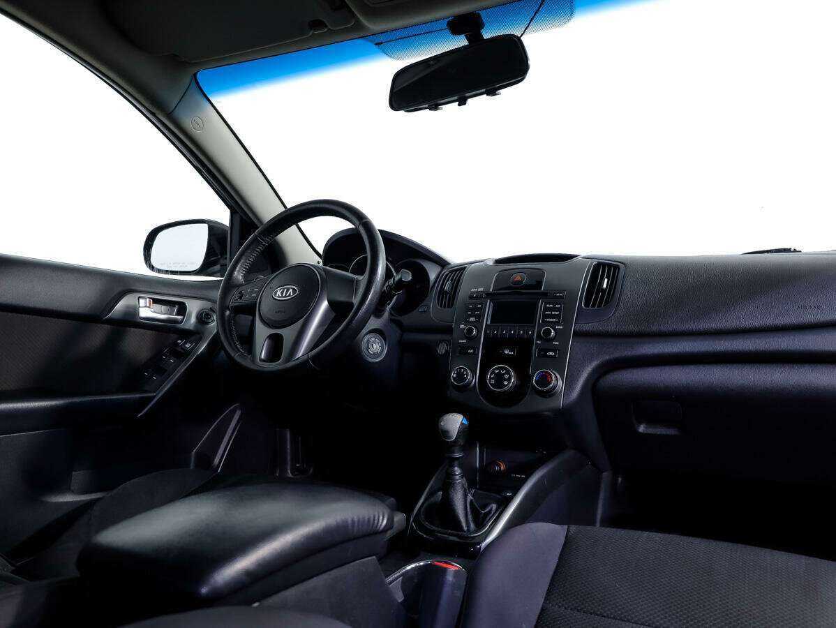 Kia Cerato с пробегом — 2011 год. Фото: #7