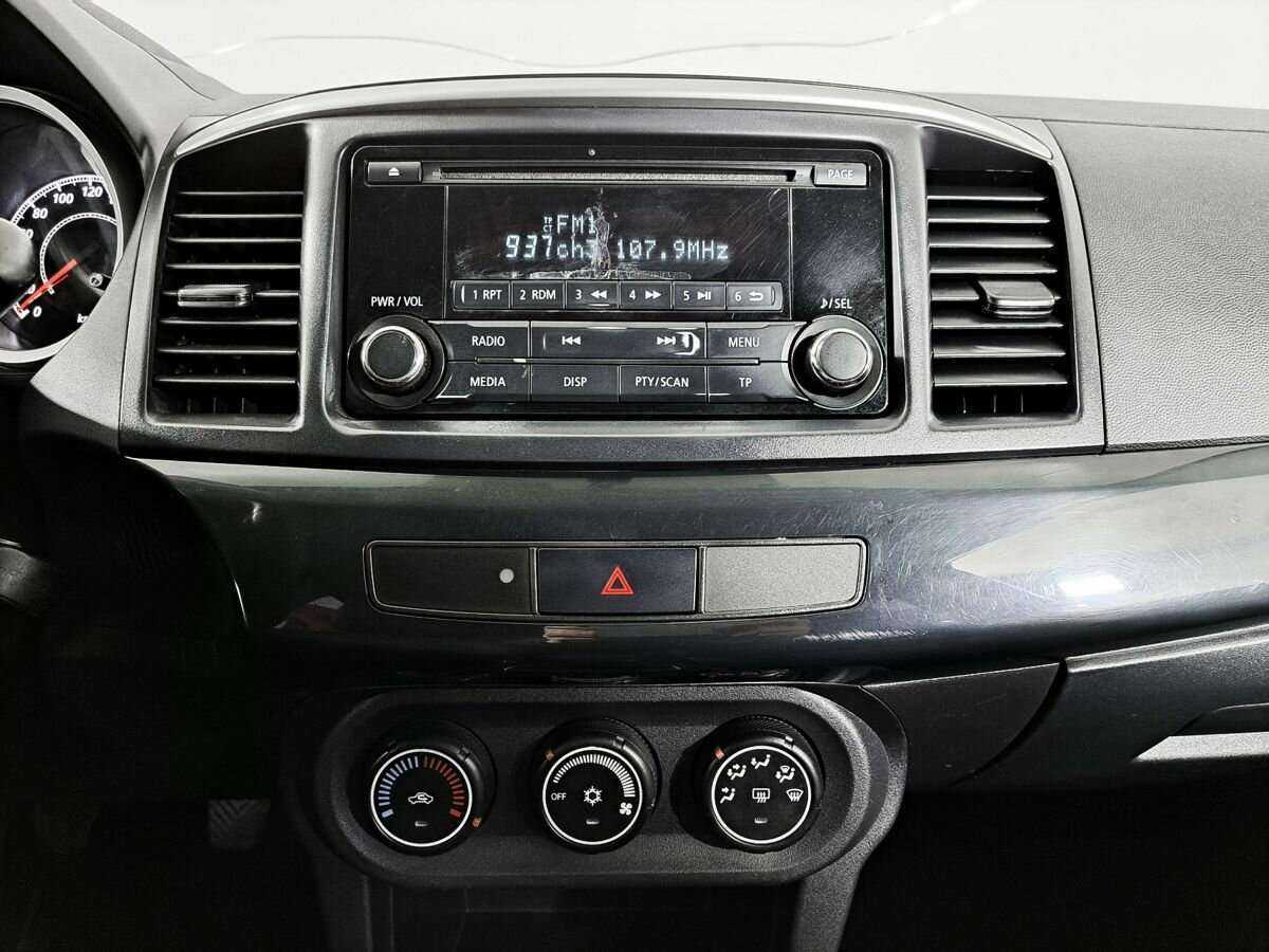 Mitsubishi Lancer с пробегом — 2012 год. Фото: #13
