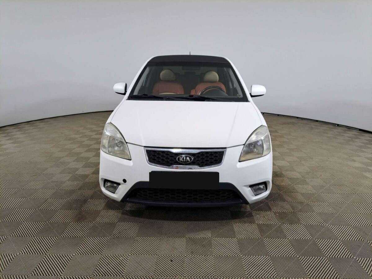 Kia Rio с пробегом — 2011 год. Фото: #1