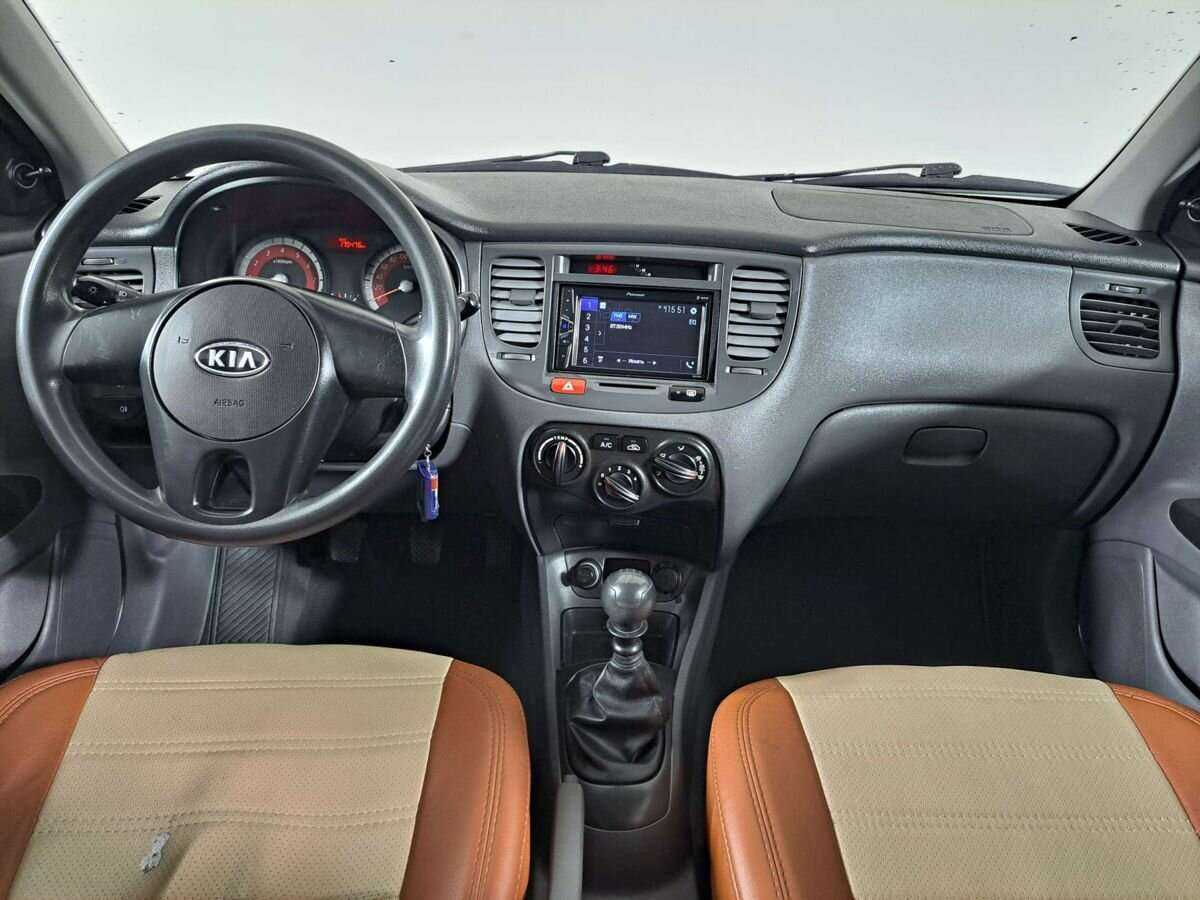 Kia Rio с пробегом — 2011 год. Фото: #11