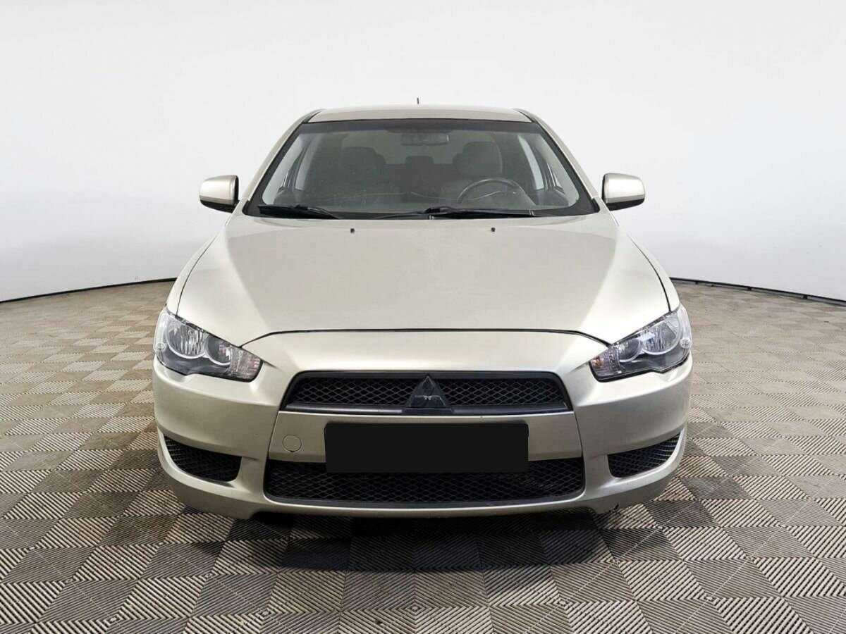Mitsubishi Lancer с пробегом — 2009 год. Фото: #1