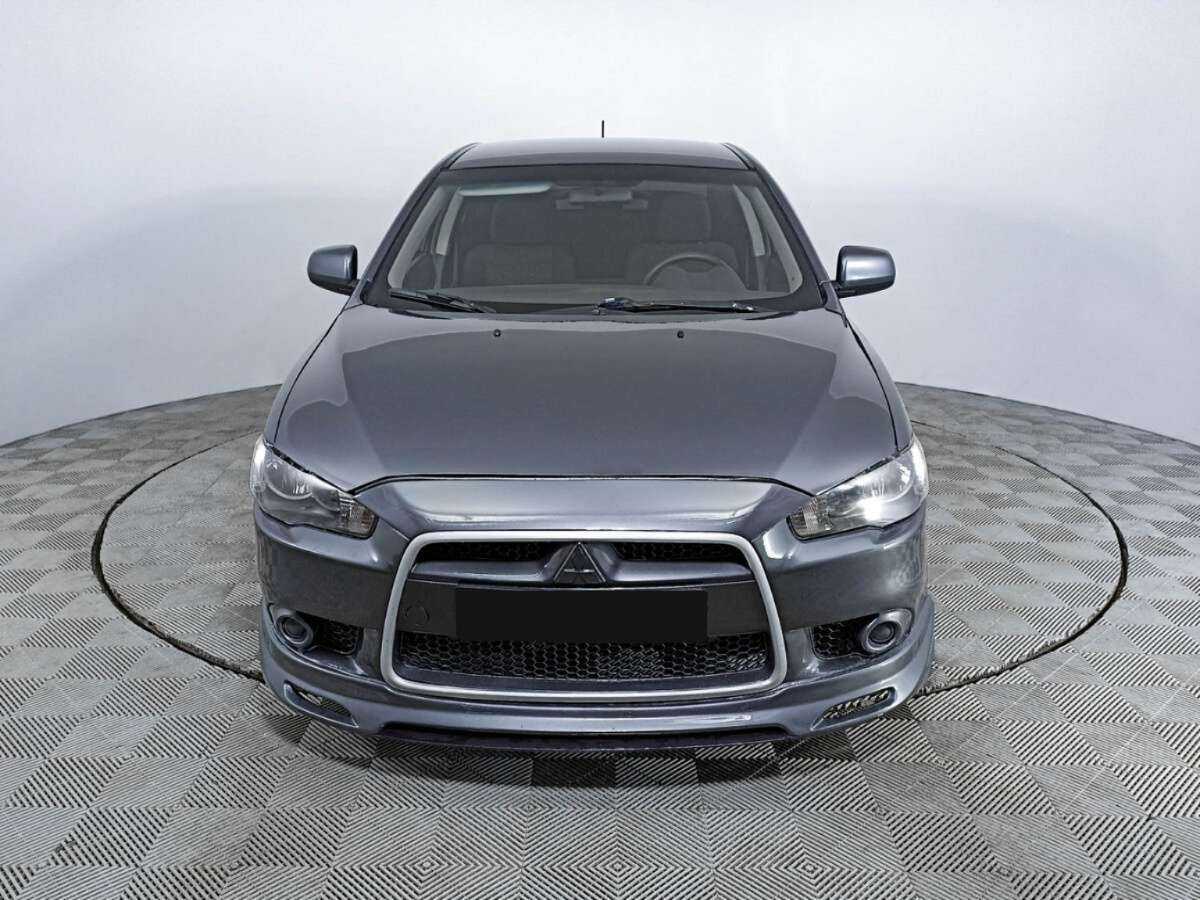 Mitsubishi Lancer с пробегом — 2011 год. Фото: #1