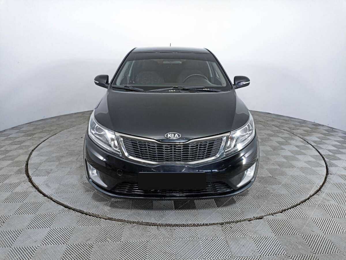 Kia Rio с пробегом — 2011 год. Фото: #1