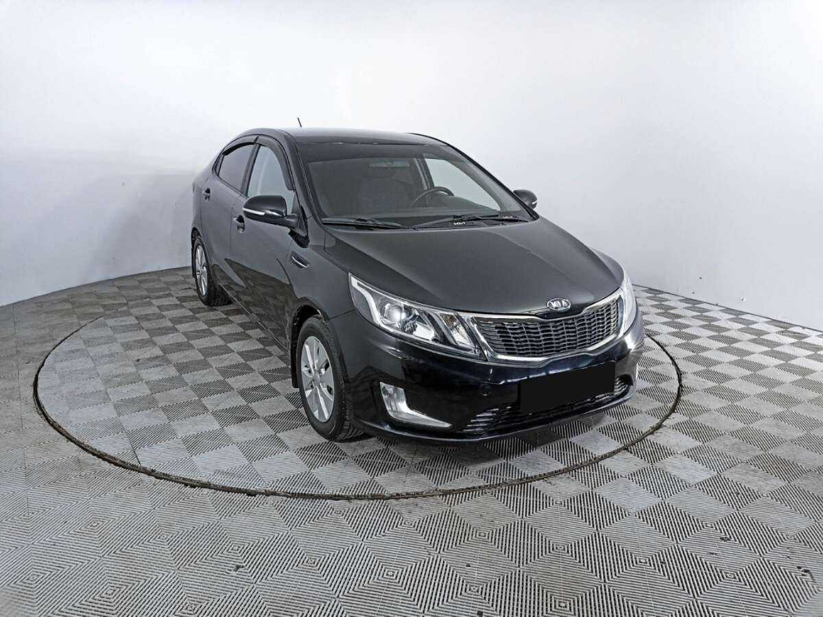 Kia Rio с пробегом — 2011 год. Фото: #2