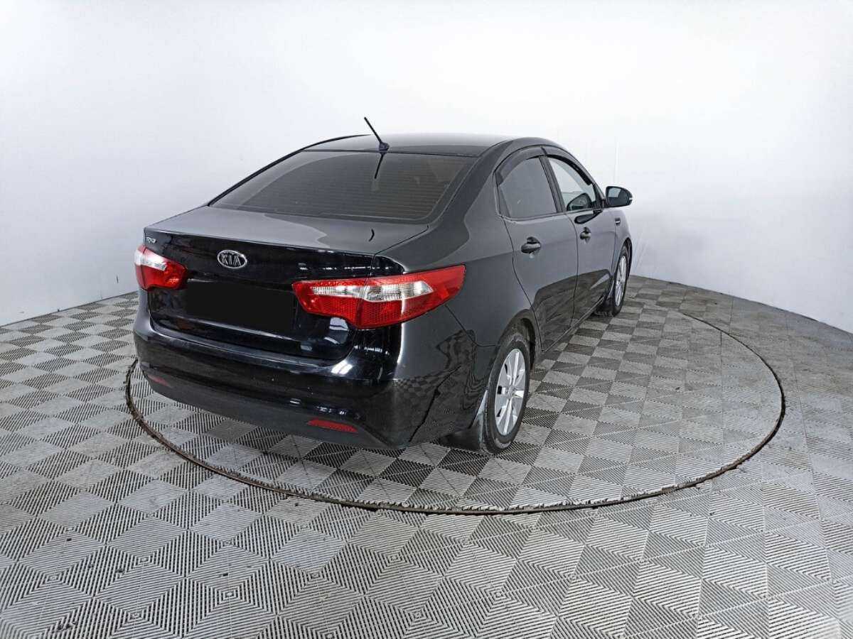 Kia Rio с пробегом — 2011 год. Фото: #4