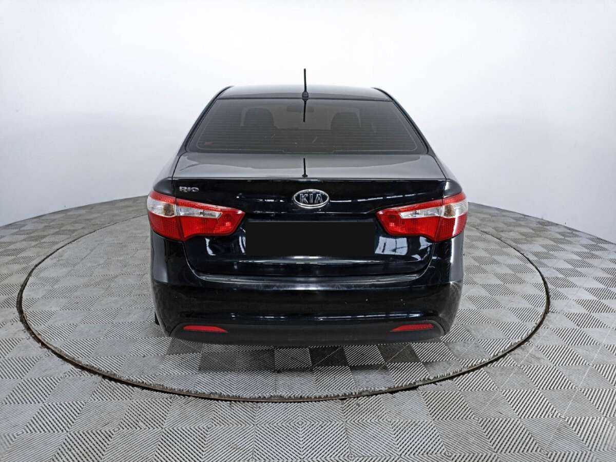 Kia Rio с пробегом — 2011 год. Фото: #5