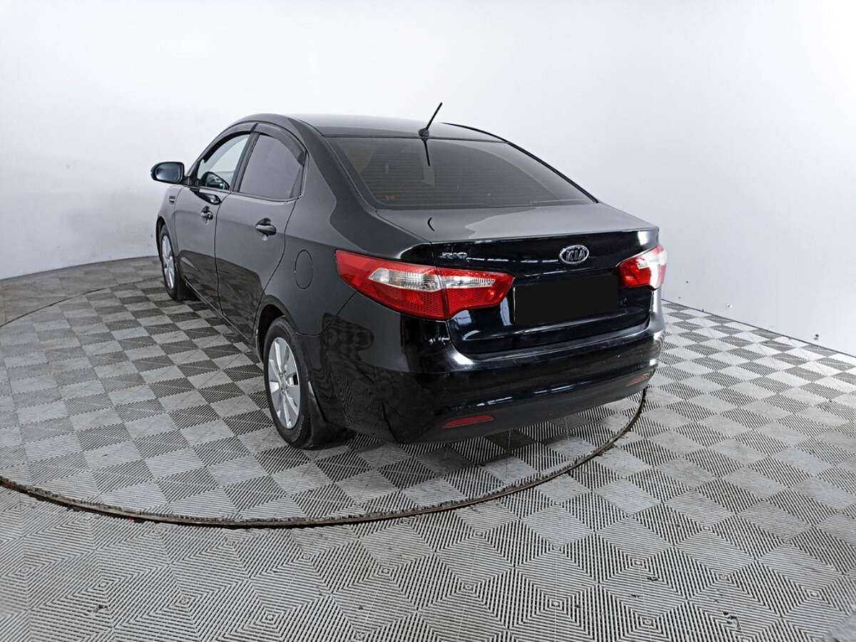 Kia Rio с пробегом — 2011 год. Фото: #6