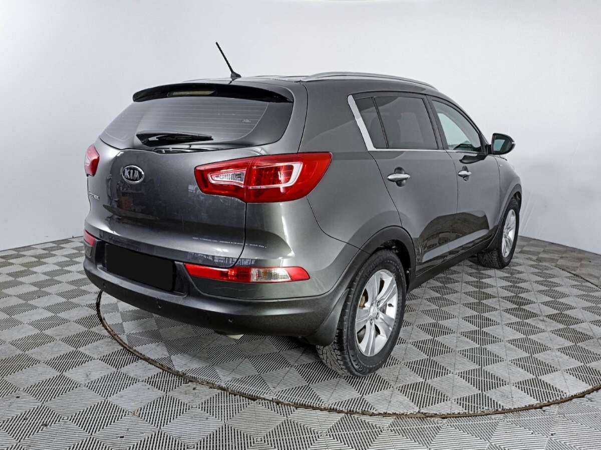 Kia Sportage с пробегом — 2011 год. Фото: #4