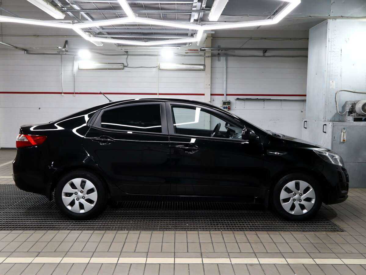 Kia Rio с пробегом — 2013 год. Фото: #11
