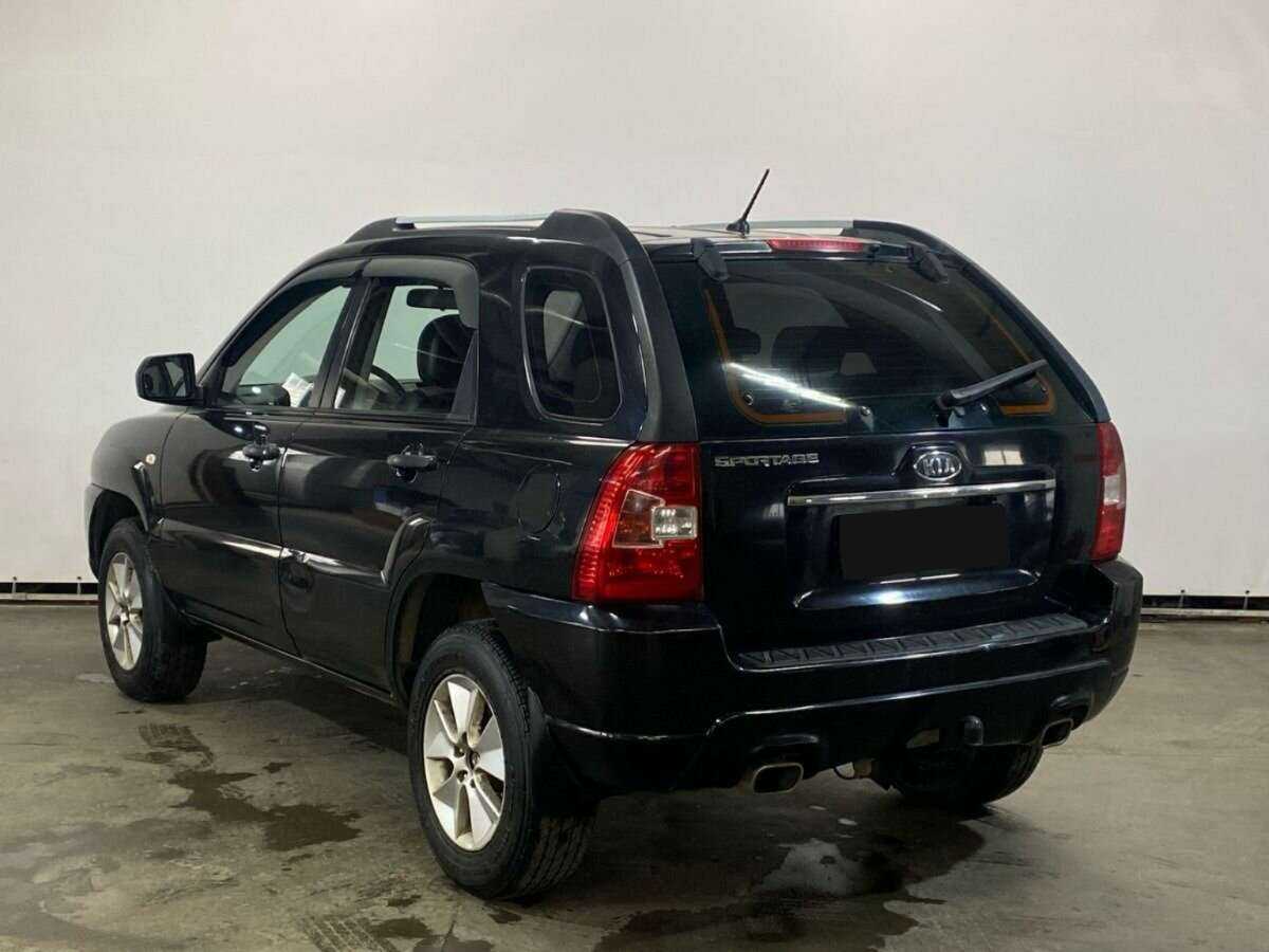 Kia Sportage с пробегом — 2009 год. Фото: #6