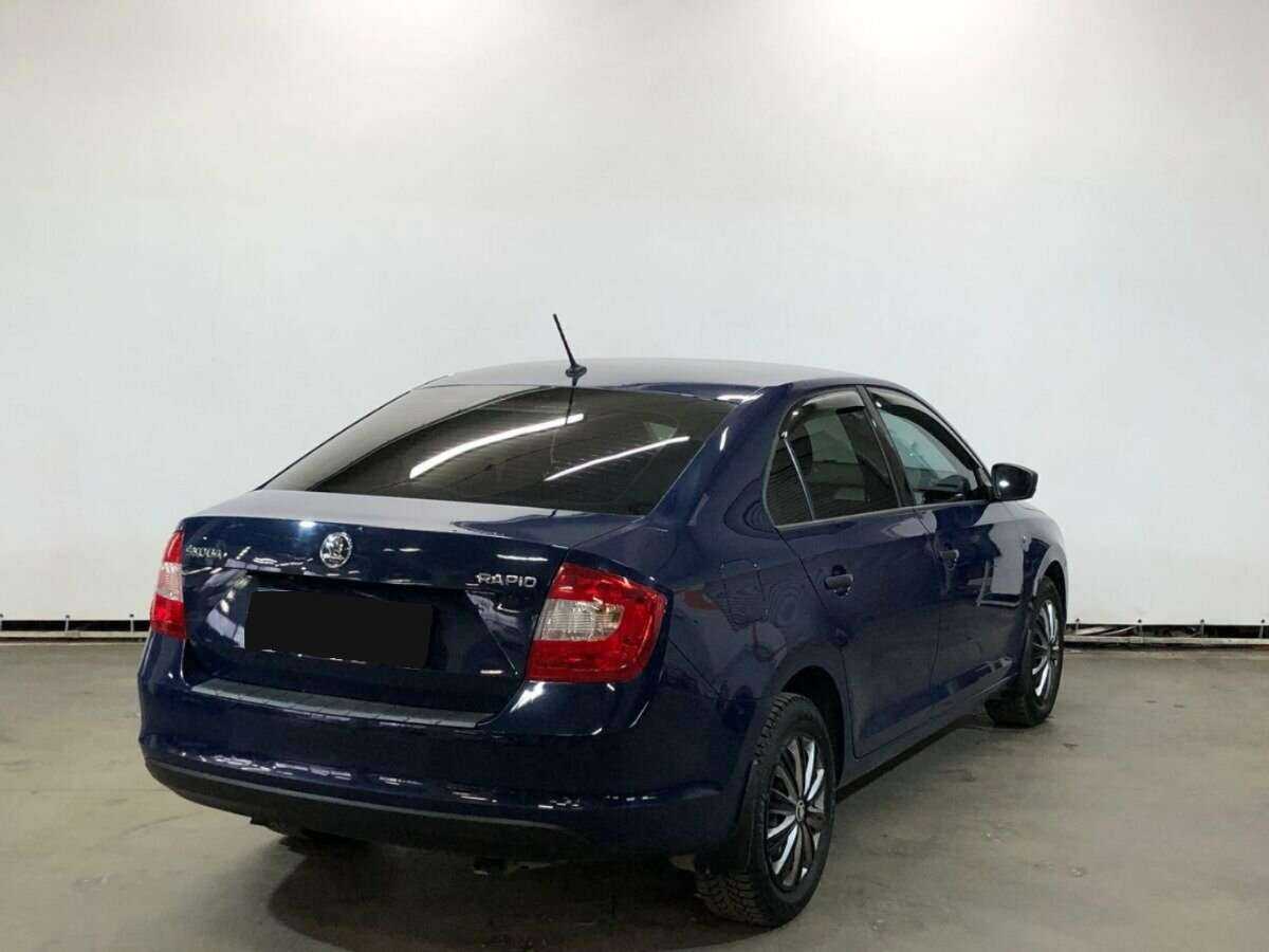 Skoda Rapid с пробегом — 2015 год. Фото: #4