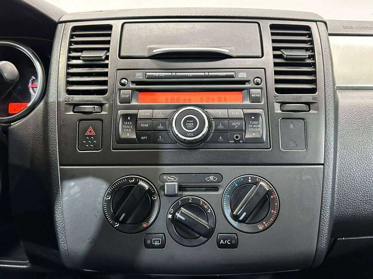 Nissan Tiida с пробегом — 2010 год. Фото: #12