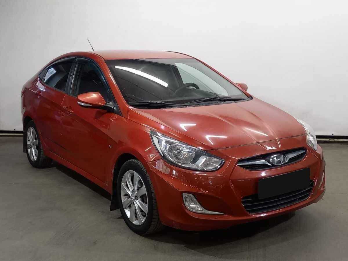 Hyundai Solaris с пробегом — 2011 год. Фото: #2