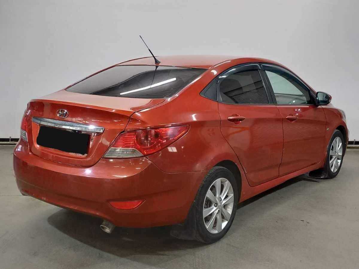 Hyundai Solaris с пробегом — 2011 год. Фото: #4