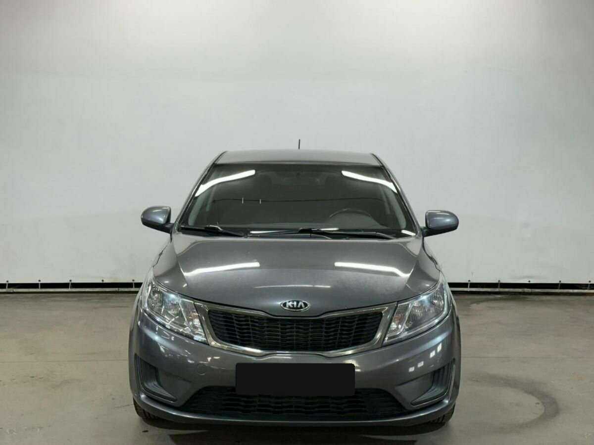 Kia Rio с пробегом — 2014 год. Фото: #1