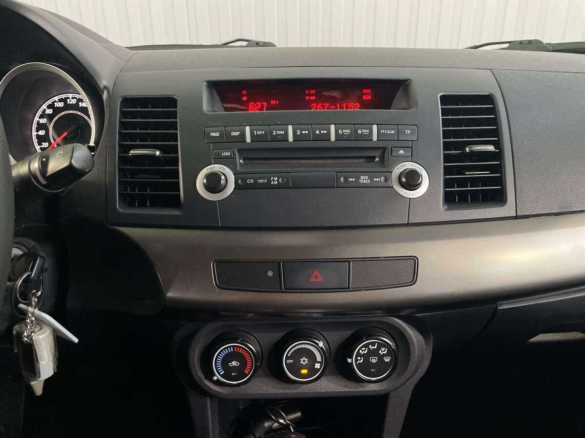 Mitsubishi Lancer с пробегом — 2011 год. Фото: #11