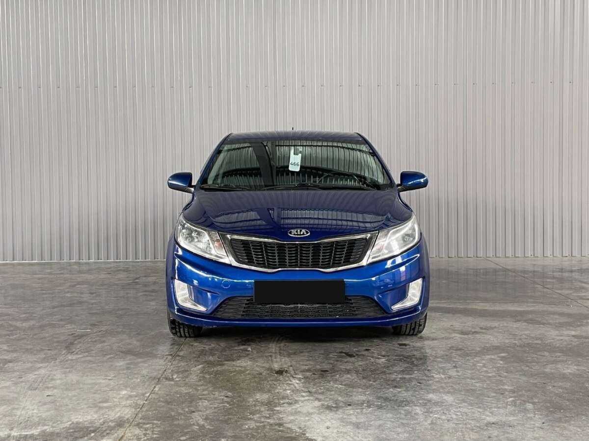 Kia Rio с пробегом — 2013 год. Фото: #1