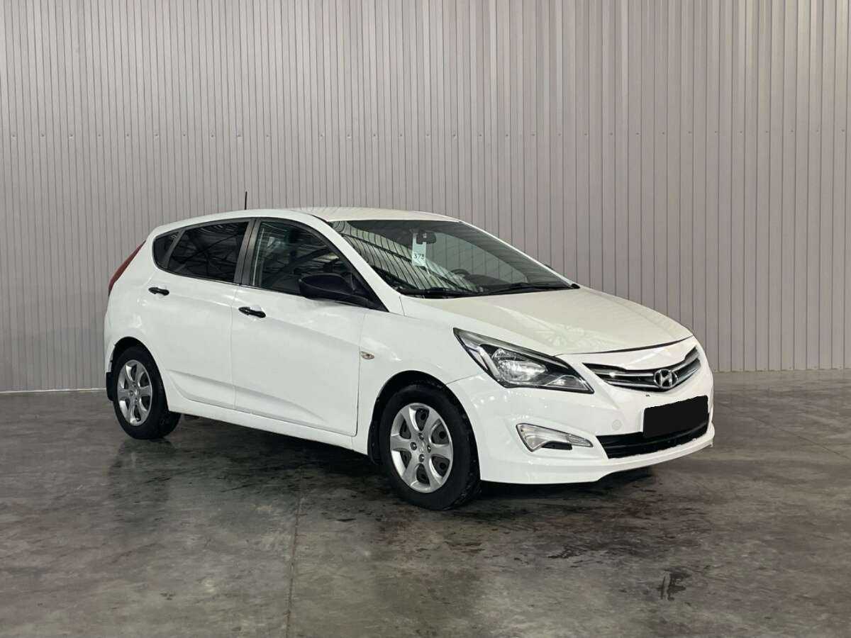 Hyundai Solaris с пробегом — 2014 год. Фото: #2