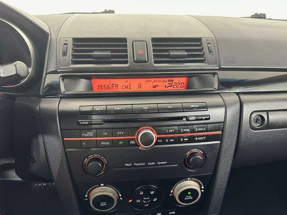 Mazda 3 с пробегом — 2006 год. Фото: #11
